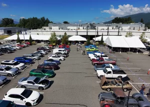 Drone photo of Building 5 with tents and car show