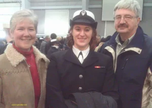 Harmony with her parents after graduating boot camp